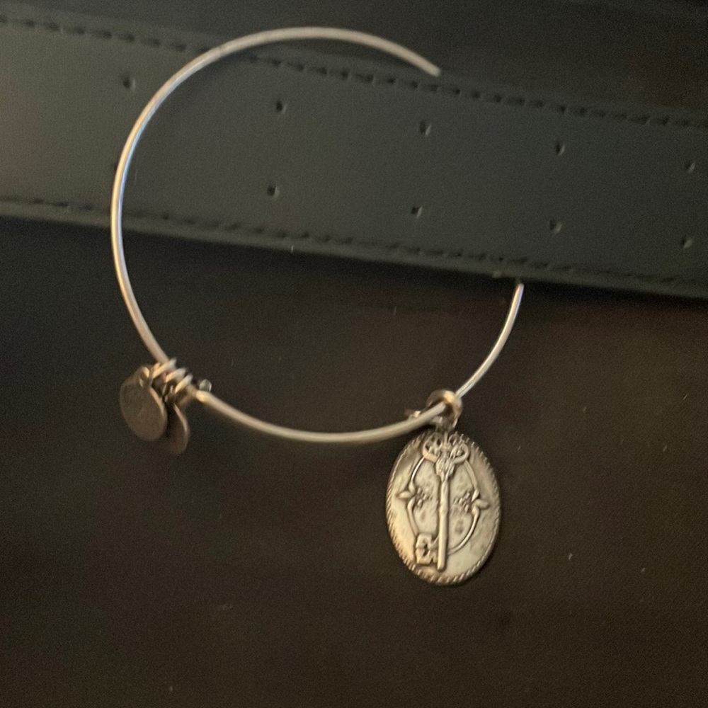 Alex and Ani  Silver Charm Bracelet Key of Life.  Needs polished